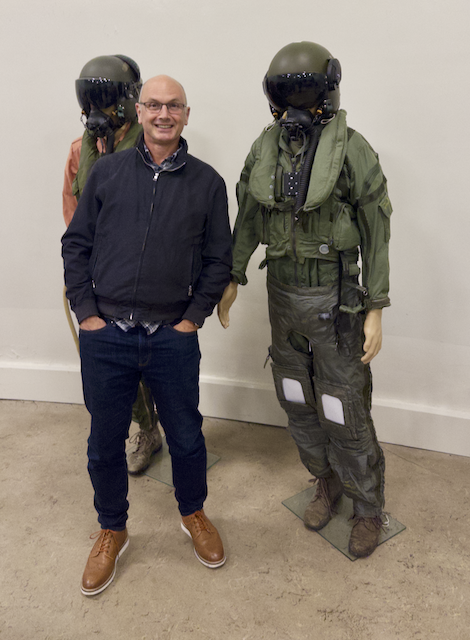 Richard in front of aircrew pressure suits